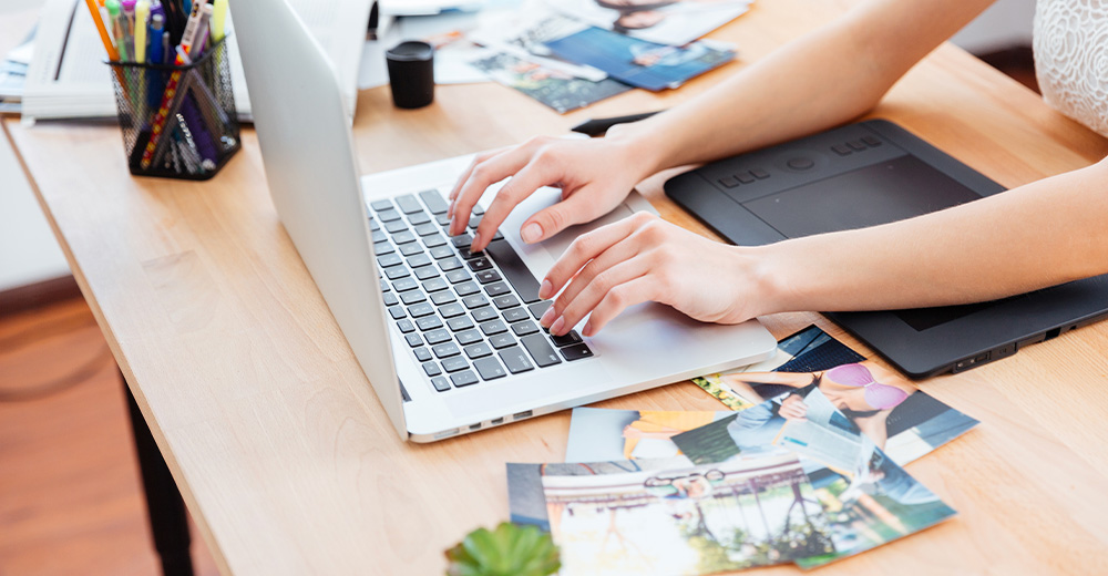 Person analyzing TikTok marketing strategy on a laptop leveraging analytics to improve content performance